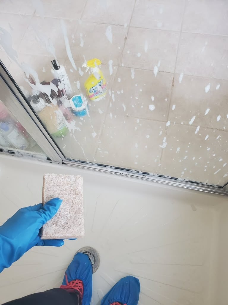 Cleaning a shower door